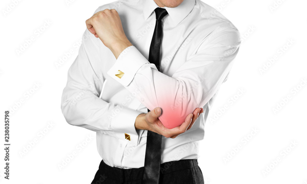 Businessman in a white shirt and tie holding hand. Pain in the elbow. Isolated on white background