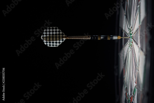 one dart in the center, bulls eye, 50 photo