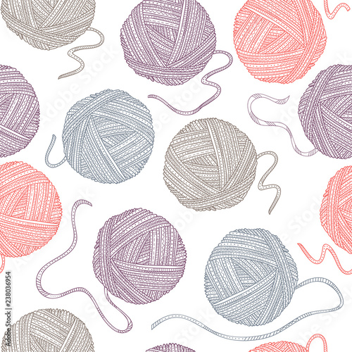 Vector seamless pattern with yarn balls in boho style