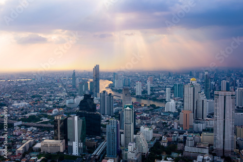 Cityscape sunset aerial view from top building, Aerial view of Bangkok city in Thailand