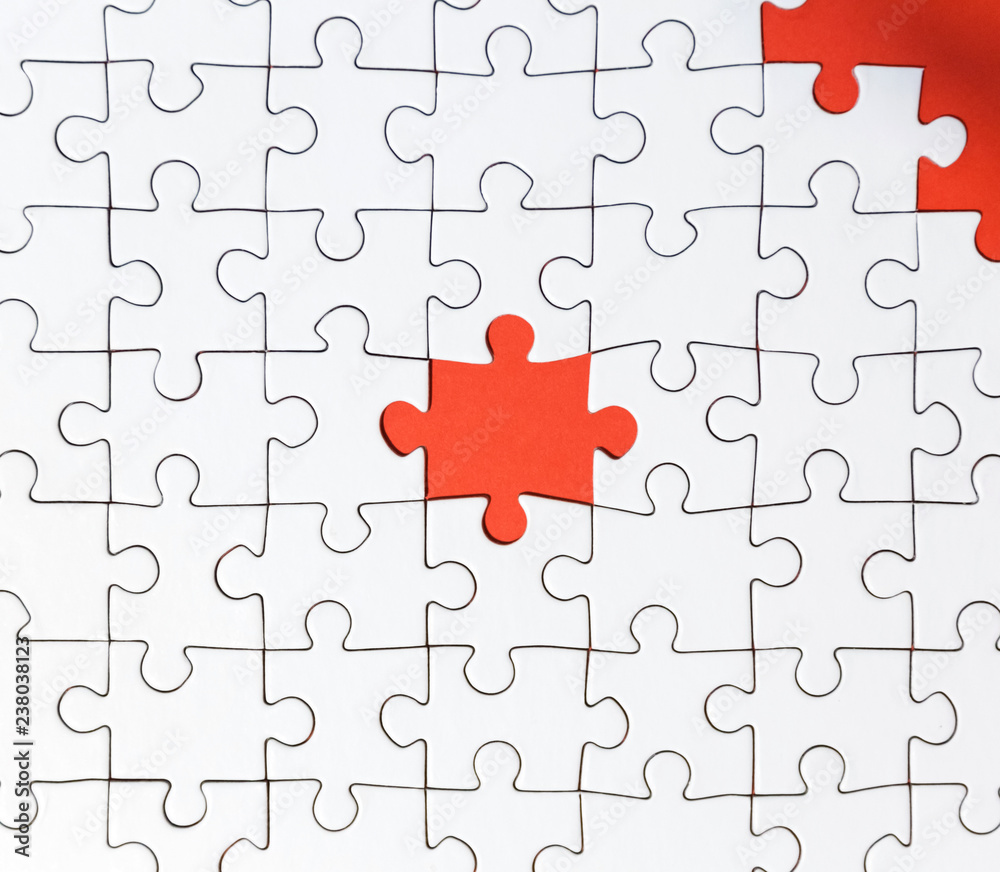 Fototapeta premium Background of white puzzle with bright res puzzle center