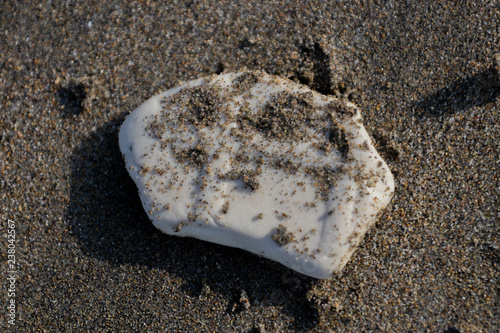 white stone over the sand