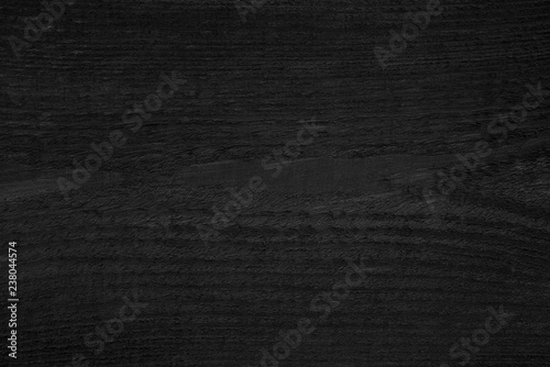 Black charcoal board, background of burnt wood texture.