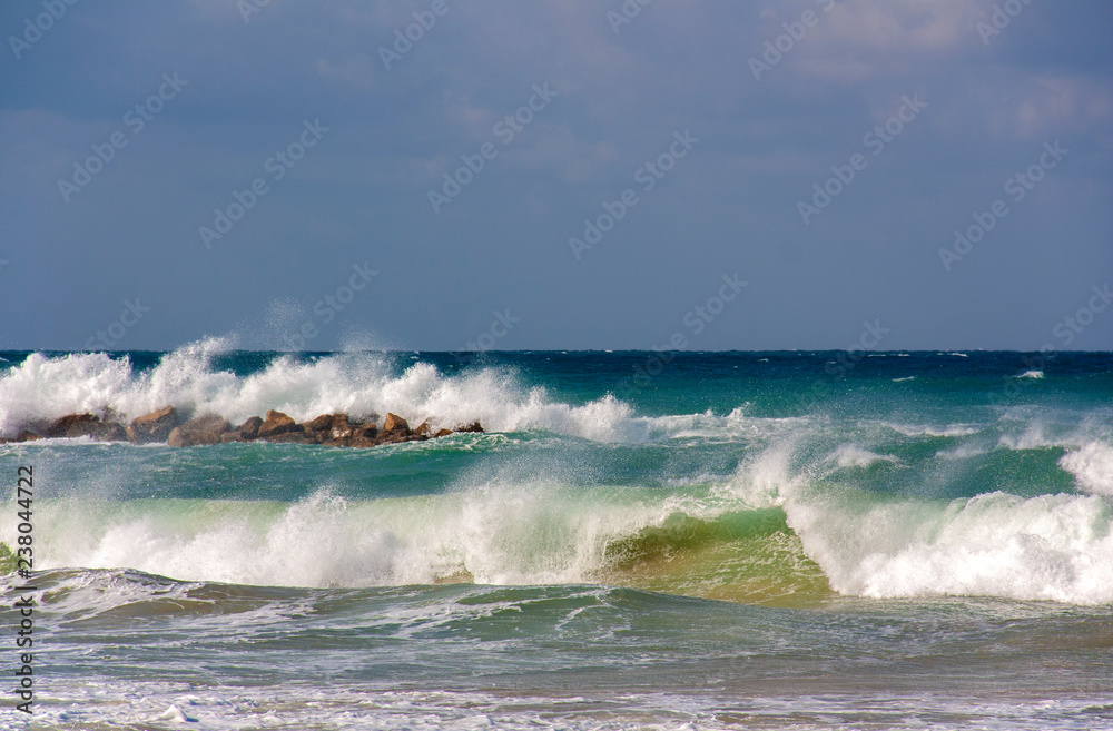 Foam waves in stormy weather on the Mediterranean sea Foam waves in stormy weather on the Mediterranean sea