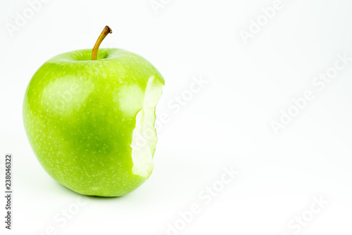 ripe green apple on black background 