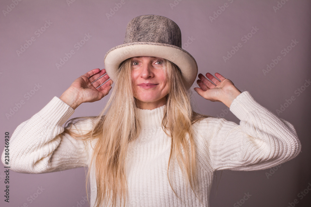 Portrait of attractive woman in theatrical hat. Portrait of attractive woman in theatrical hat.