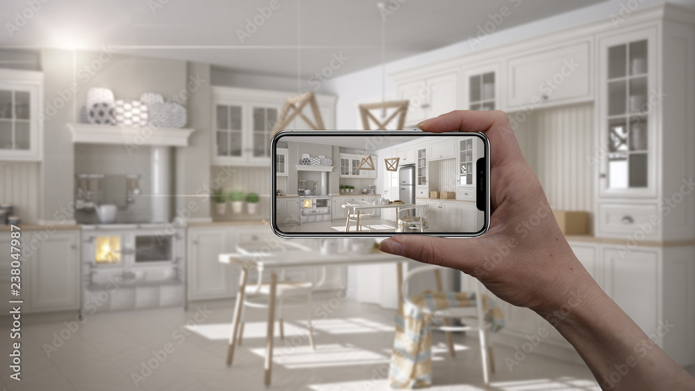 Hand holding smart phone, AR application, simulate furniture and ...