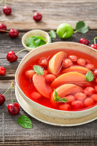 Enjoy your fruit soup with cherries, apples and mint