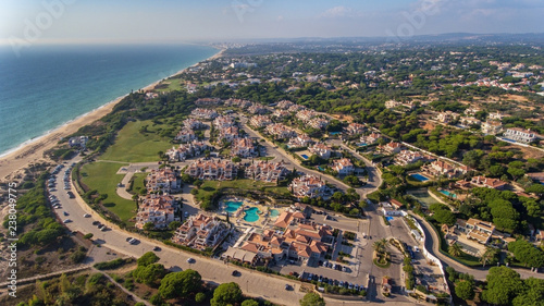 Aerial. View from the sky at the tourist town Dunas Douradas, Vale de Lobo.