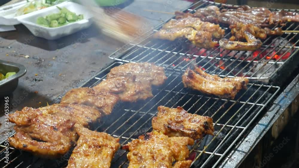 Grilling meat, street food, Vietnam Grilling meat, street food, Vietnam