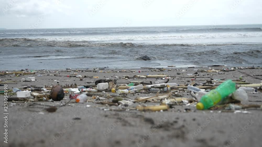 Garbage on the ocean. Beach polluted with plastic bottles Garbage on the ocean. Beach polluted with plastic bottles