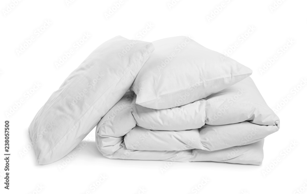 Clean blanket and pillows on white background - obrazy, fototapety, plakaty 