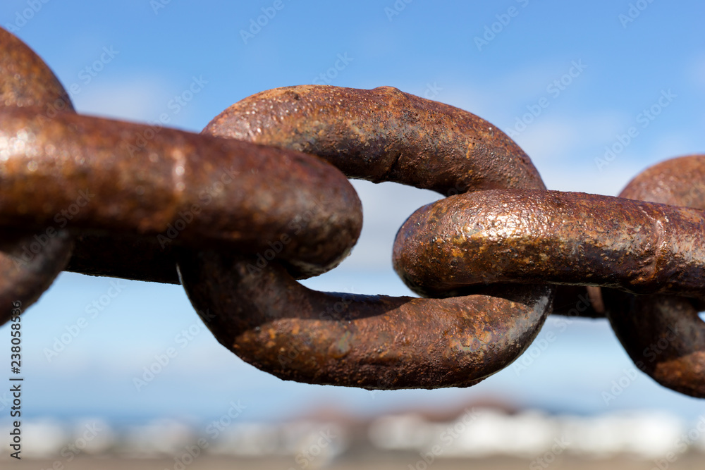Big rusty chain link. Closely and inseparably connected Big rusty chain link. Closely and inseparably connected