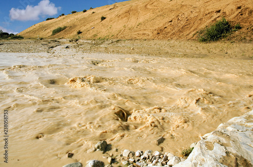 Konstfotografi Flash flood in a desert river