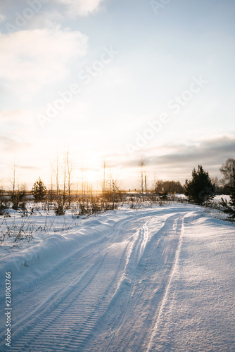 Winter sunny landscape in countryside (snowy road) © Yula