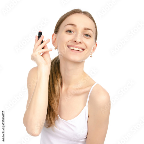 Beautiful woman beauty fashion lipstick in hand on white background isolation.