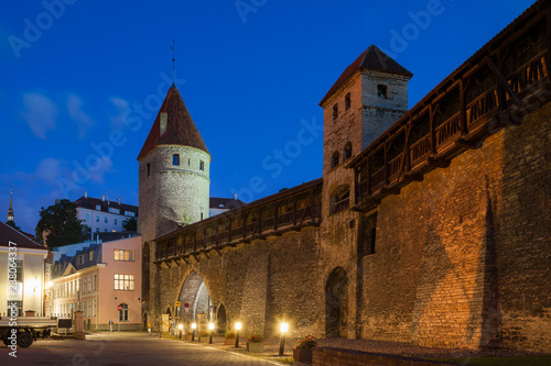 Scenic view of the evening street and the wall with towers in the Old Town in Tallinn, Estonia