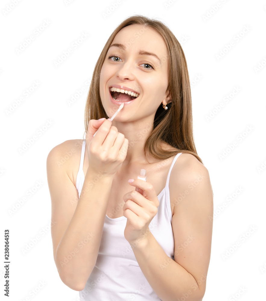 Beautiful woman beauty fashion lip gloss in hand on white background isolation. Beautiful woman beauty fashion lip gloss in hand on white background isolation.