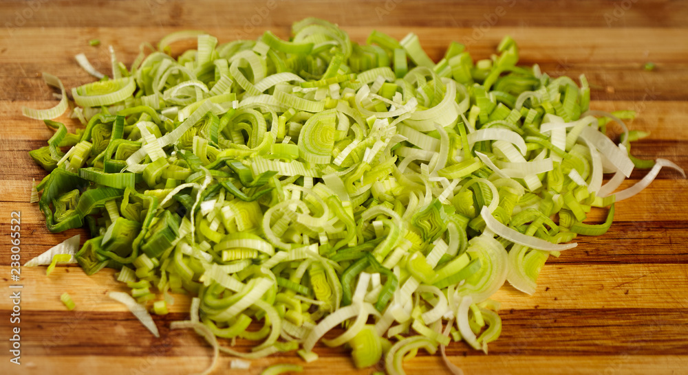 Chopped leek on a board, macro Chopped leek on a board, macro
