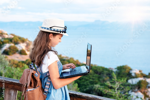 Young blogger on the beach.