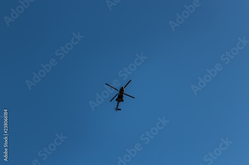 Helicopter flying over the sky