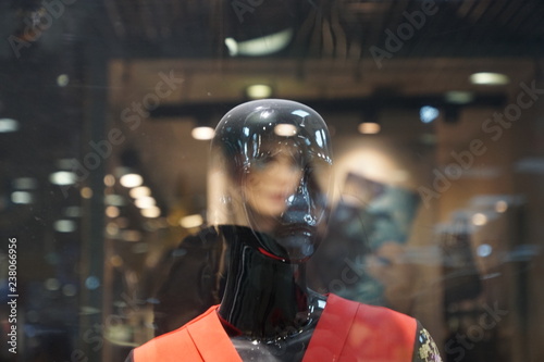 mannequin in red with reflections
