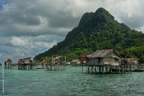 East Malaysia. Sibuan island near the city of Semporna. Calm in the fishing village of sea Gypsies photo