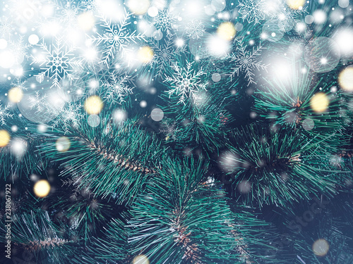 Christmas tree texture background with snow falling and snowflake