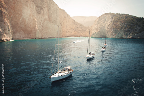  Flotilla of sailing yachts in the bay. Beautiful seascape.