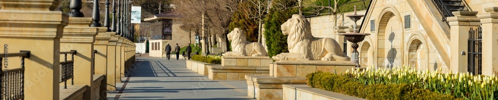 wide panorama of embankment with lions shapes and tulips in Odessa in Ukraine