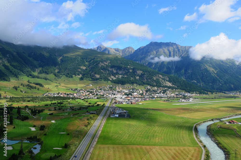 Swiss alps: Airshot from Samedan golfcourse, airport and train station in the upper Engadin