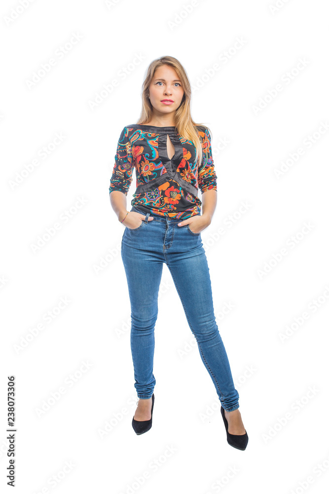 Beautiful girl in trendy jeans on isolated background Beautiful girl in trendy jeans on isolated background