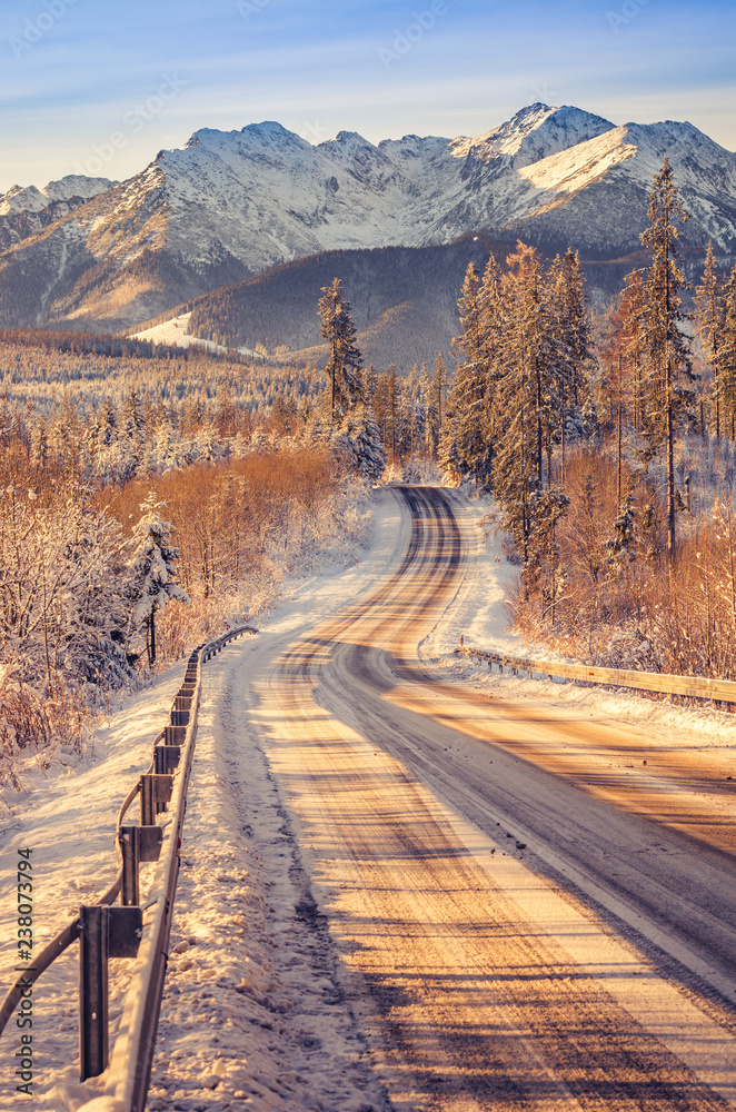 Winter road landscape, snowy Tatra mountains, Poland