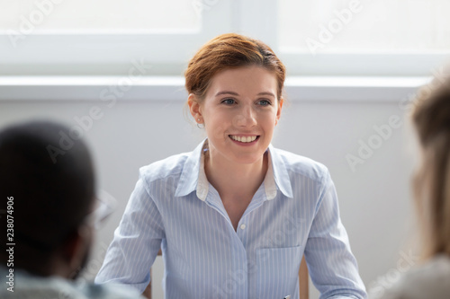 Free Download Businesspeople gathered together in conference room communicating discussing new project focus on attractive positive millennial woman. People during job interview, human resources and hiring concept - GFXLoad