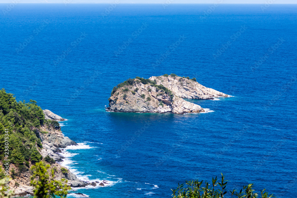 View from the mountains to the rocks in the Aegean Sea on the Greek island of Thassos