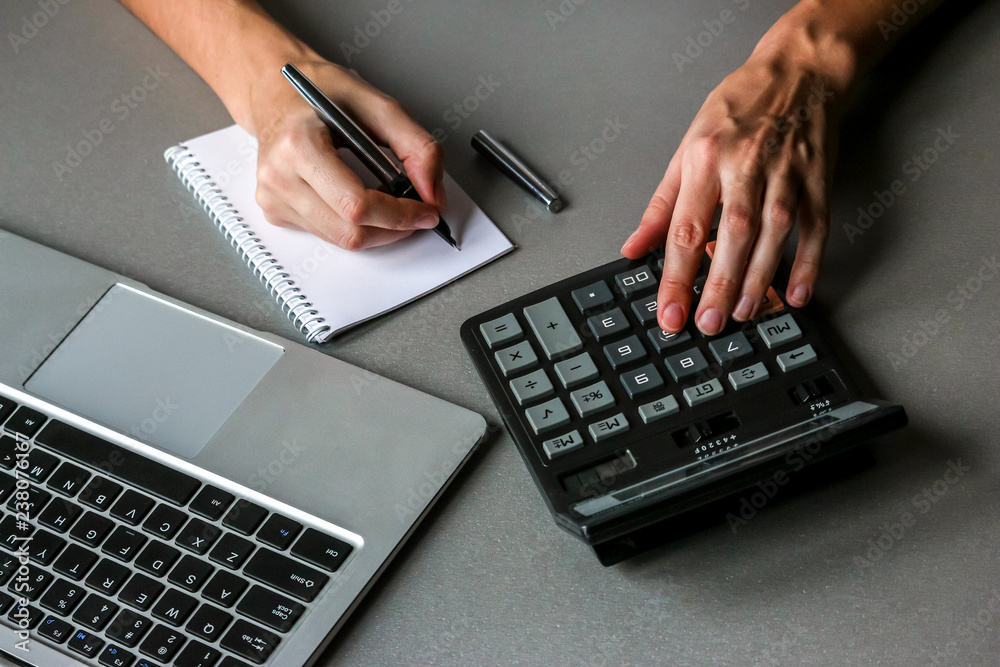 Close up view of business woman making notes. Close up view of business woman making notes.