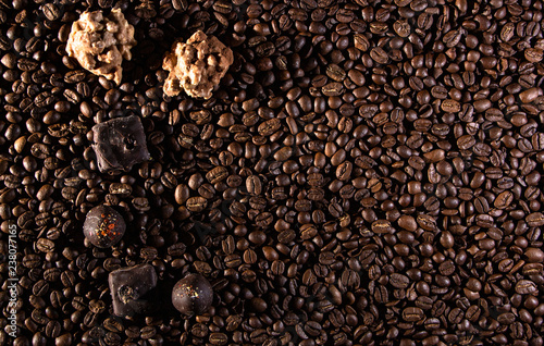 Chocolate pieces and coffee beans close up