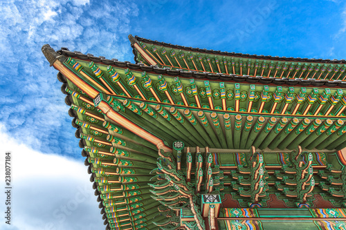 Colorful details of a temple in Seoul in a blue sky day