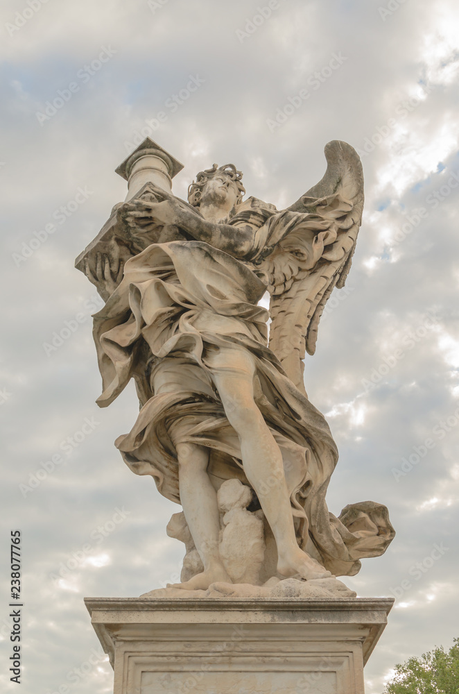 Obraz premium Marble statue of an angel in Rome, Italy.