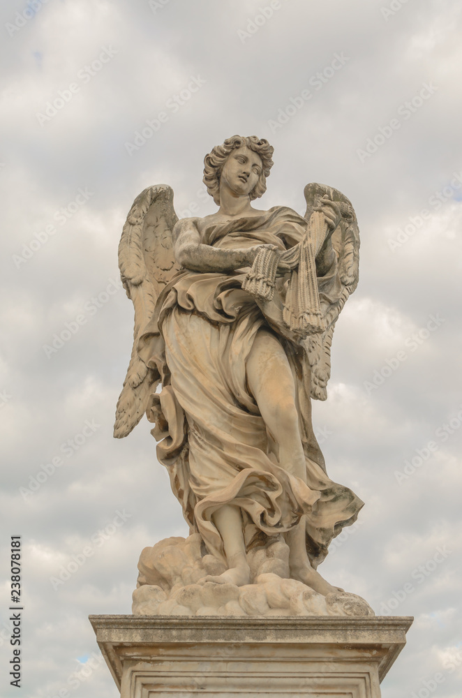 Marble statue of an angel in Rome, Italy.