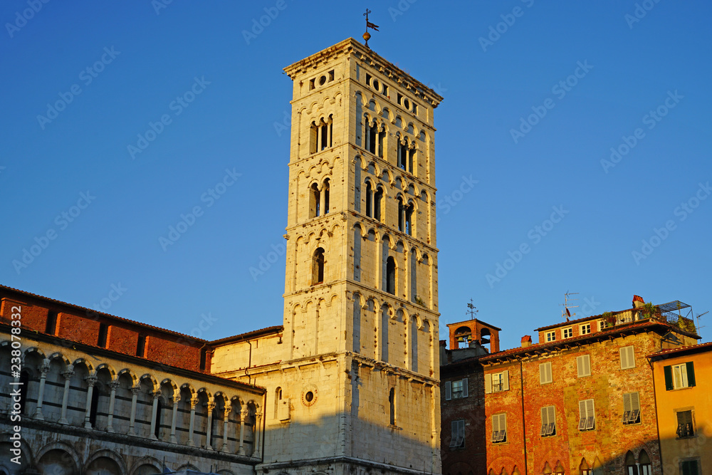 View of the landmark San Michele in Foro, a historic Romanesque Roman Catholic basilica in Lucca, a historic city in Tuscany, Central Italy