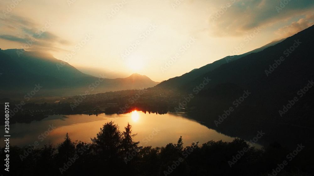Lake sunset view. magic hour. golden dusk sky. aerial view. Levi
