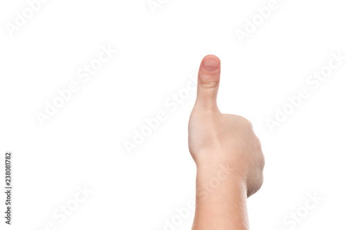 child hand with thumb up photo