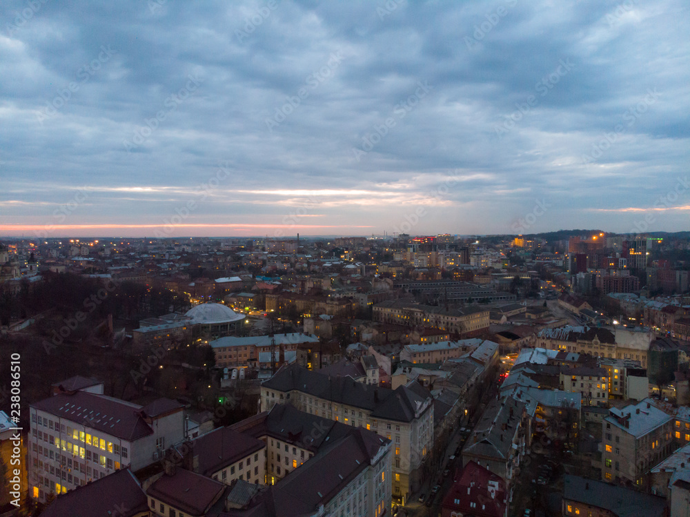 panoramic view of old european city in the evening. city light