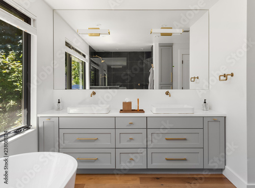 Photography Beautiful Bathroom Double Vanity in New Home, with Large Mirror