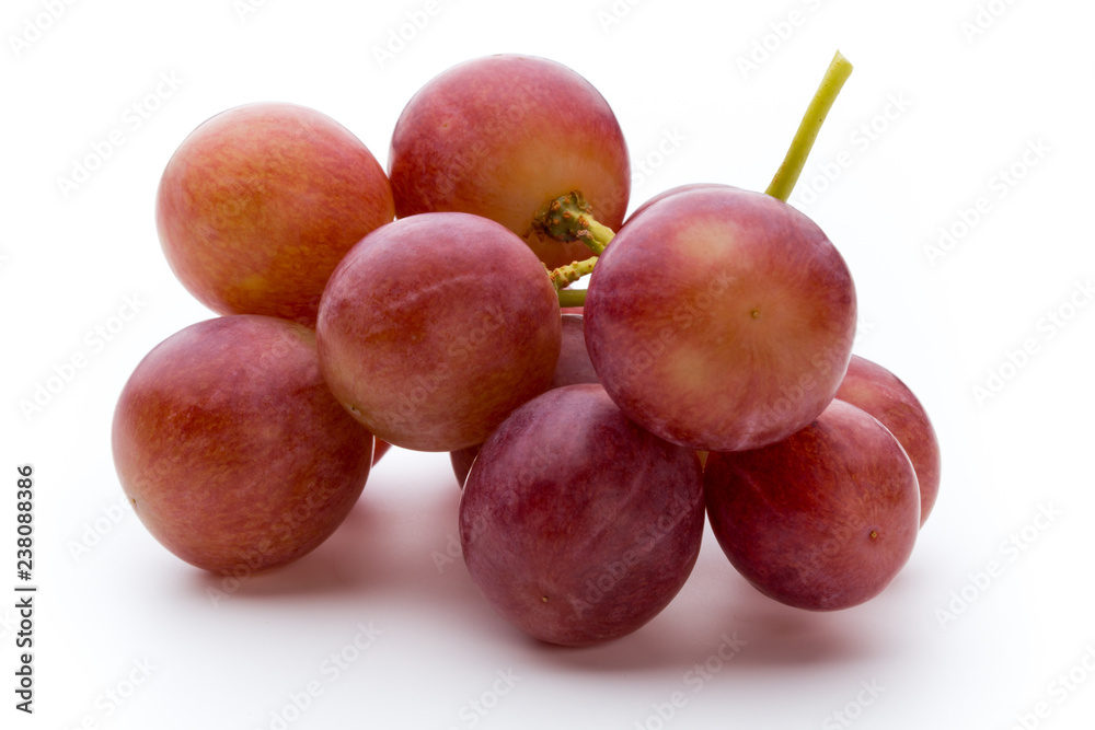 Obraz premium Ripe red grape isolated on white.