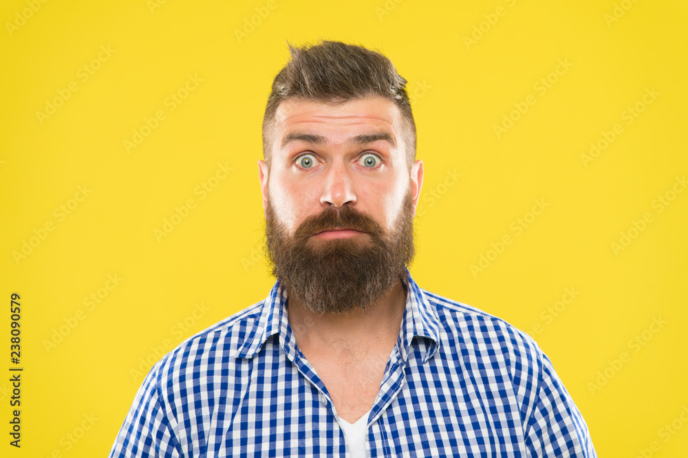 Surprising news. Man bearded hipster wondering face yellow background close up. Guy surprised face expression. Hipster with beard and mustache emotional surprised expression. Rustic surprised macho Surprising news. Man bearded hipster wondering face yellow background close up. Guy surprised face expression. Hipster with beard and mustache emotional surprised expression. Rustic surprised macho