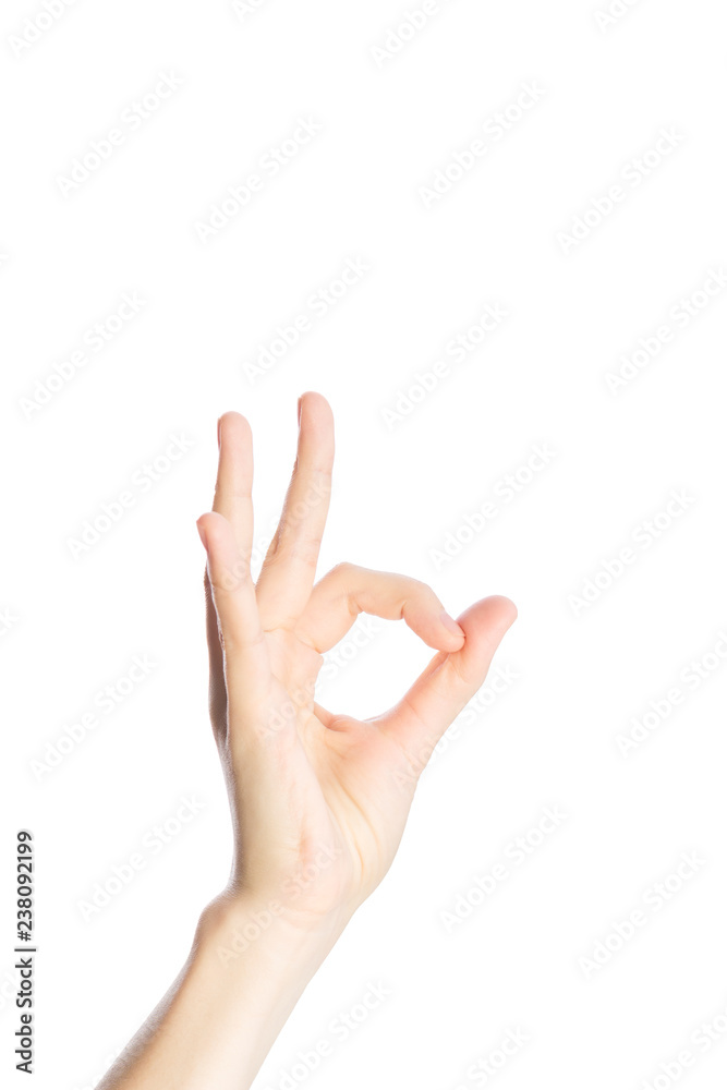 Woman hand show okay gesture on a white background isolated Woman hand show okay gesture on a white background isolated