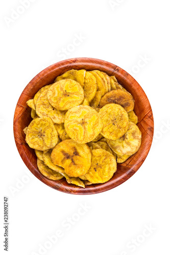 Pile of crunchy sliced dehydrated plaintain fruit chips