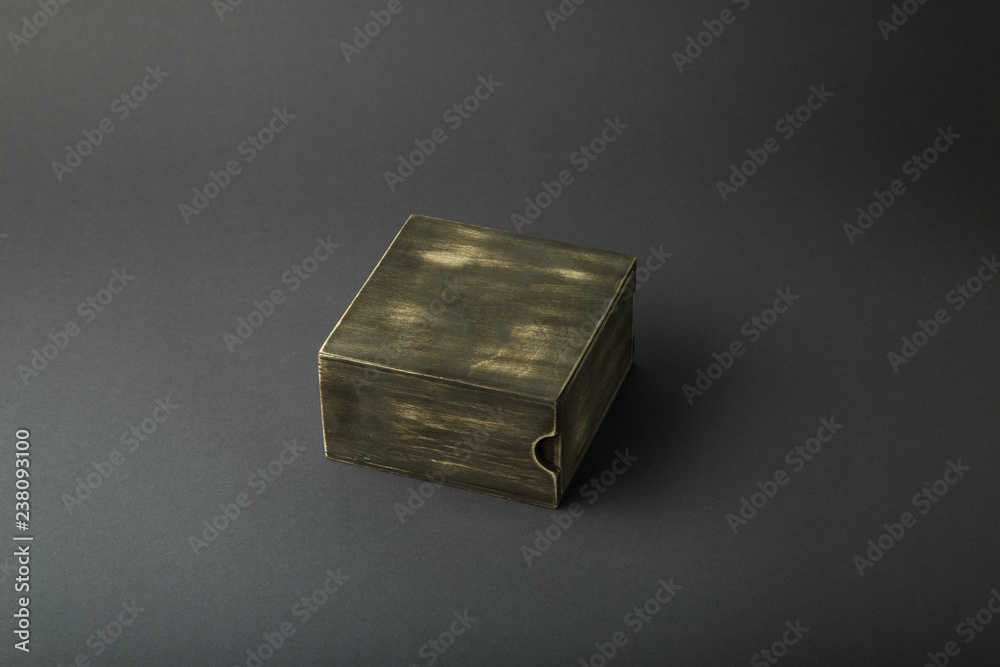 Wooden box, gift wrap, on a dark background Wooden box, gift wrap, on a dark background